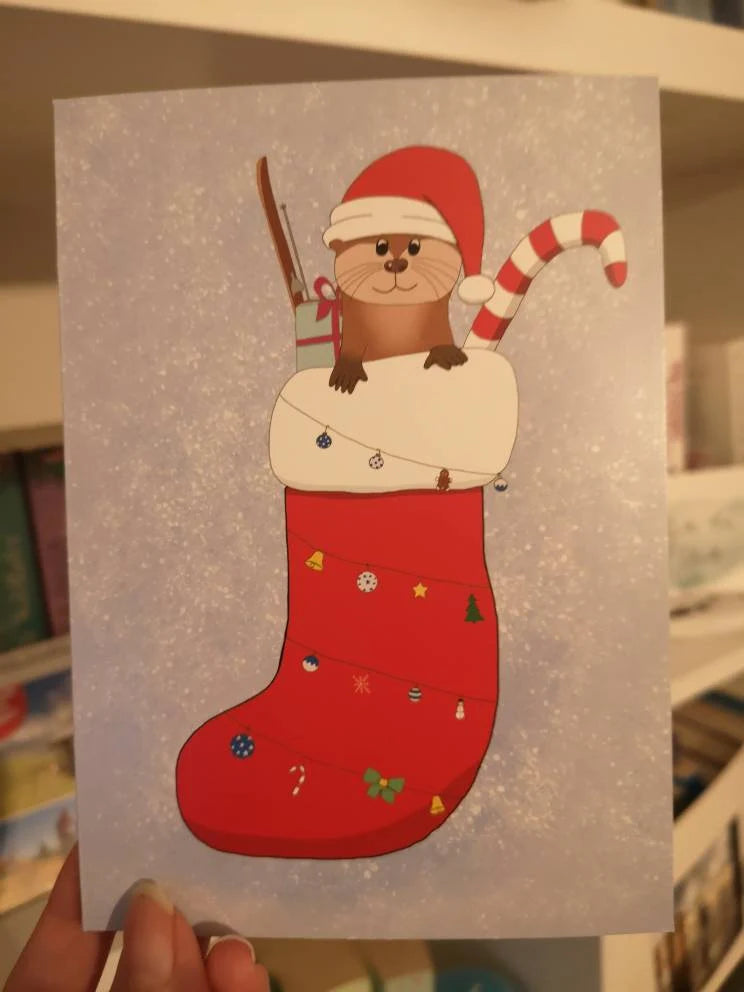 Klappkarte A6 Otter im Strumpf | Grußkarte Weihnachtskarte | Weihnachtsotter im Strumpf mit Geschenken